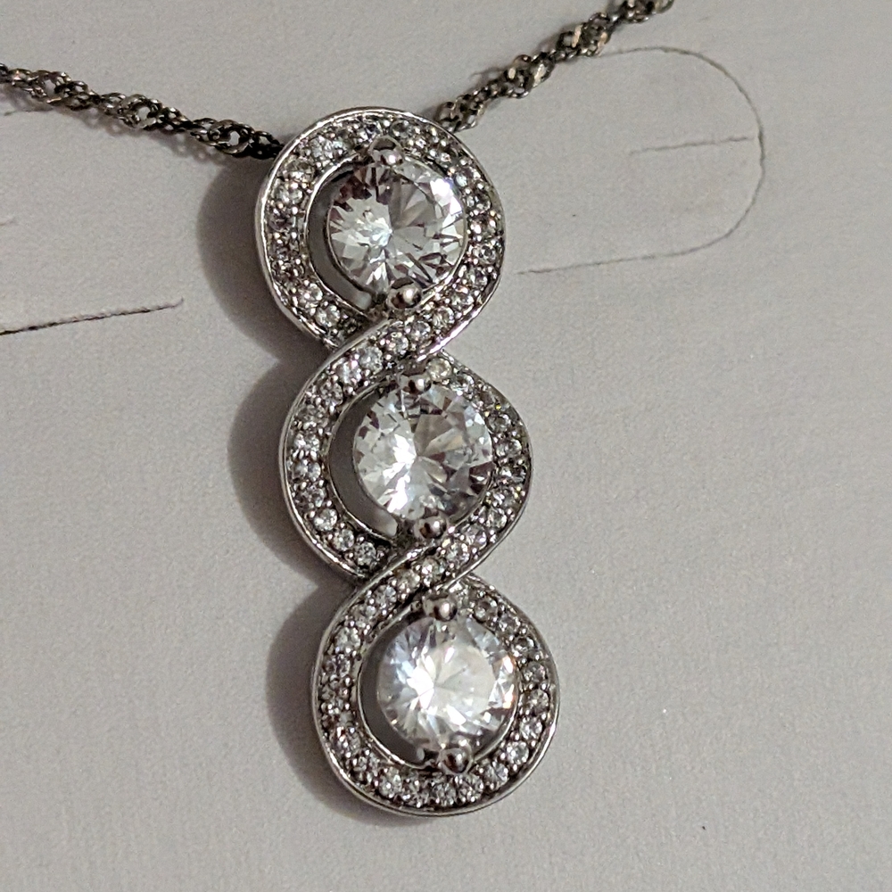 Elegant Silver Infinity Pendant Necklace - Picture 2 of 5